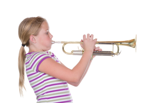 A girl playing the trumpet